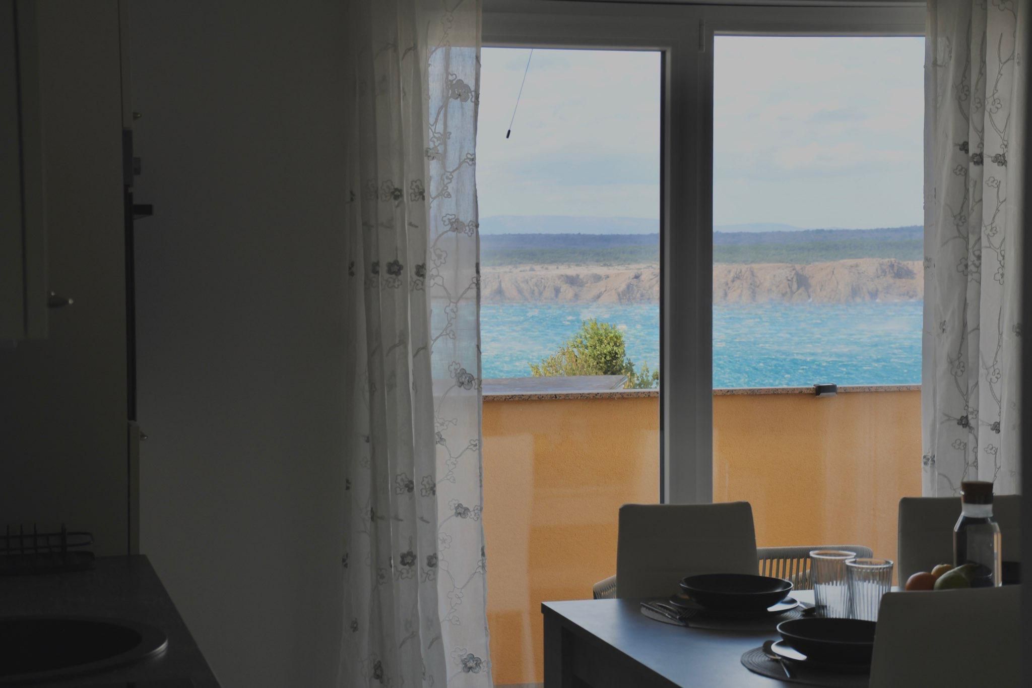 Sea view through apartment window
